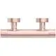 Brausethermostat in Rosé von Ideal Standard mit runden Bedienknöpfen und seitlichen Anschlüssen, geliefert in einer schlichten Bauform.